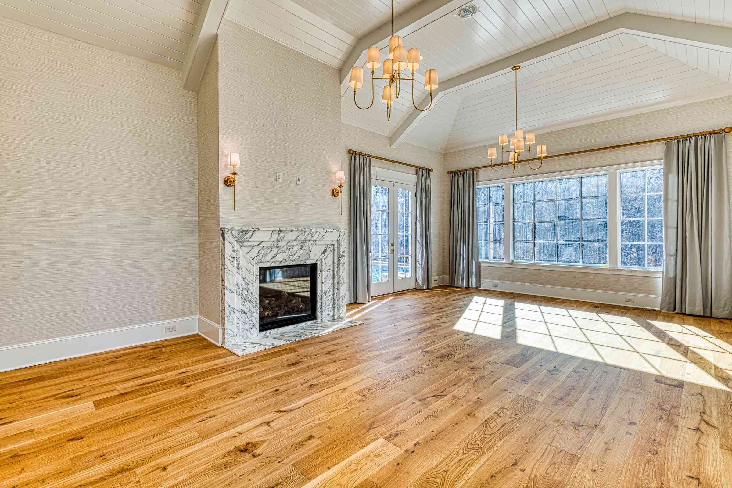 Primary bedroom owner's suite with tray ceiling by Shail Construction in Raleigh NC