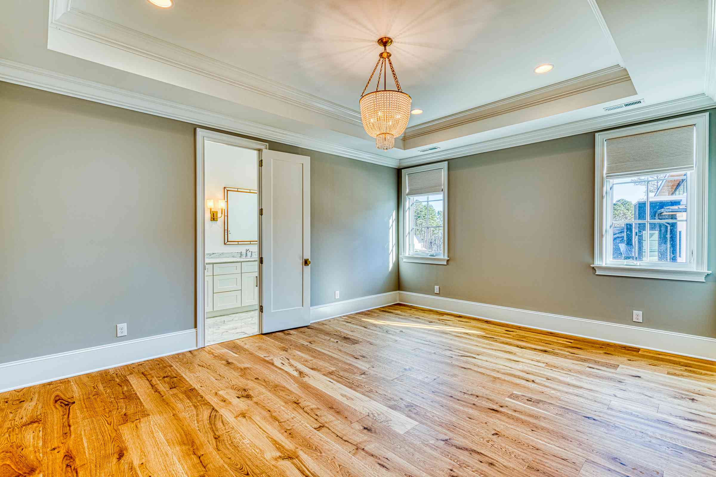 Primary bedroom with custom millwork by Shail Construction in Raleigh NC