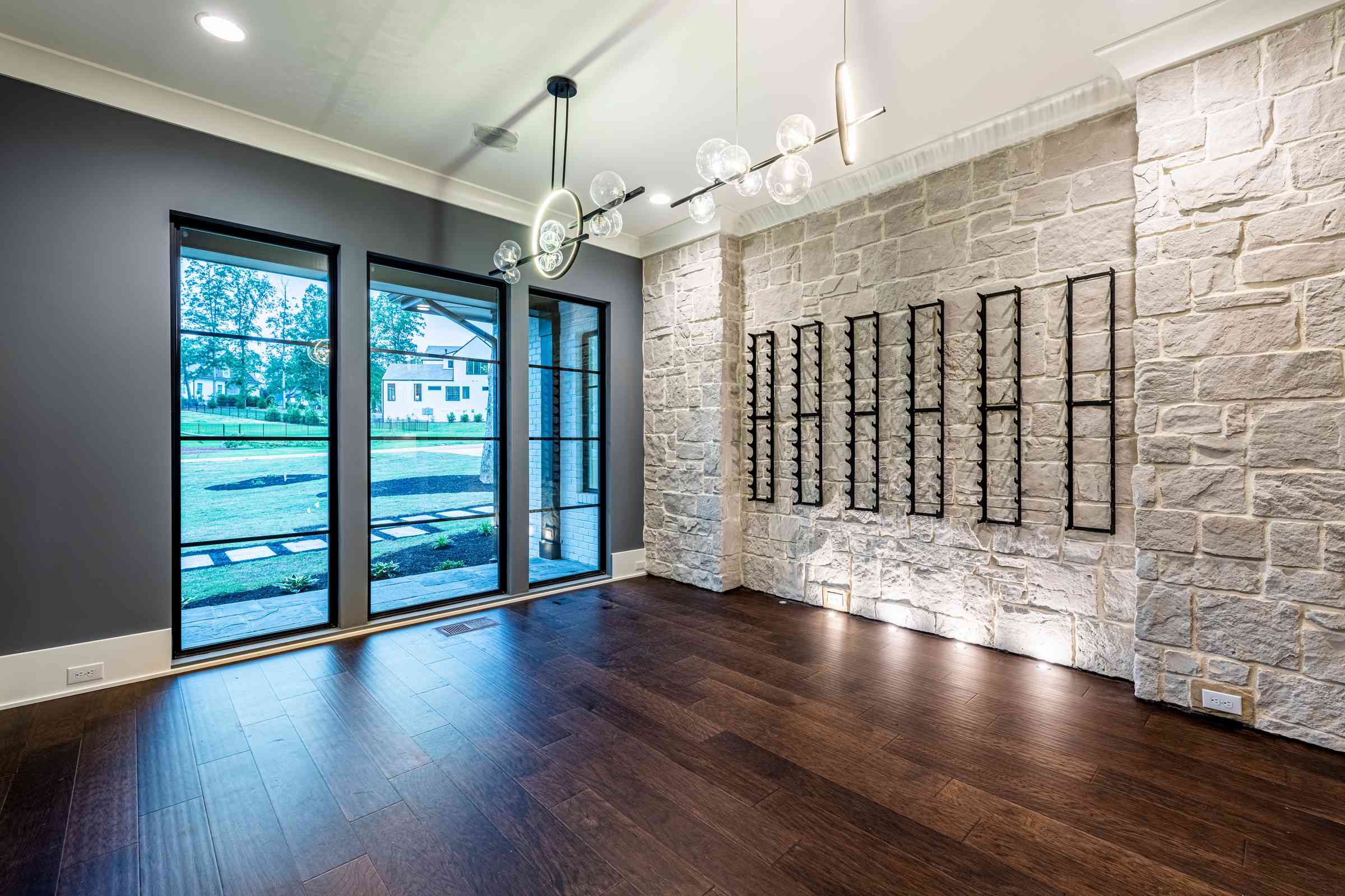 Open dining room with banquette seating by Shail Construction in Durham NC