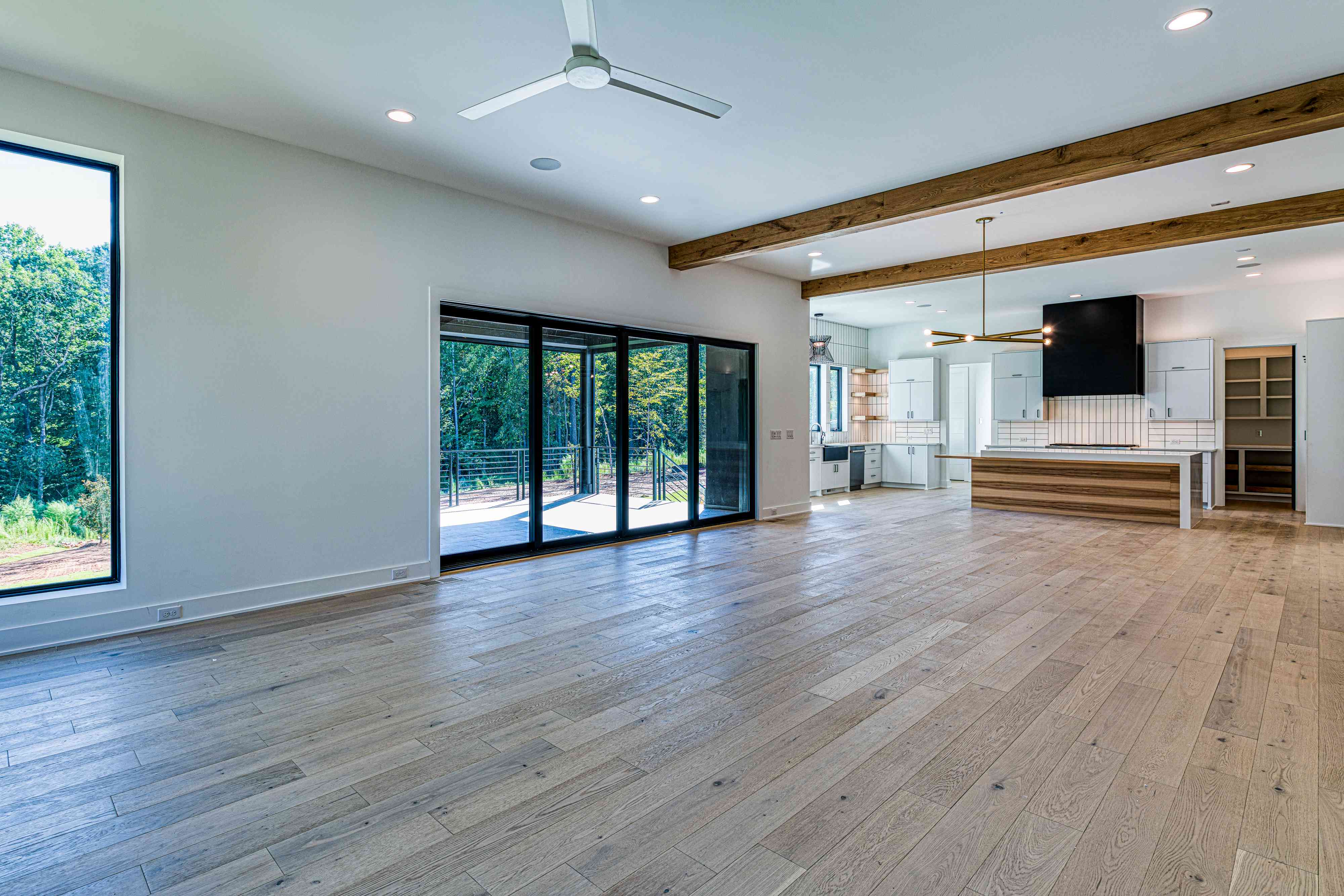 Family room with stone fireplace by Shail Construction in Raleigh NC