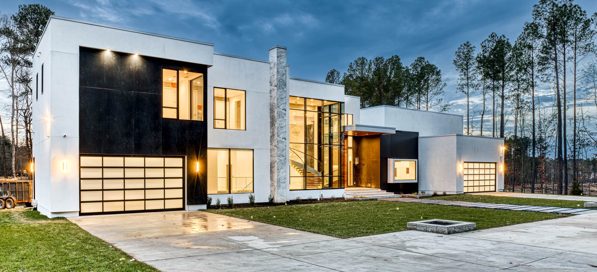Evening panorama of a modern custom home by Shail Construction in Raleigh NC