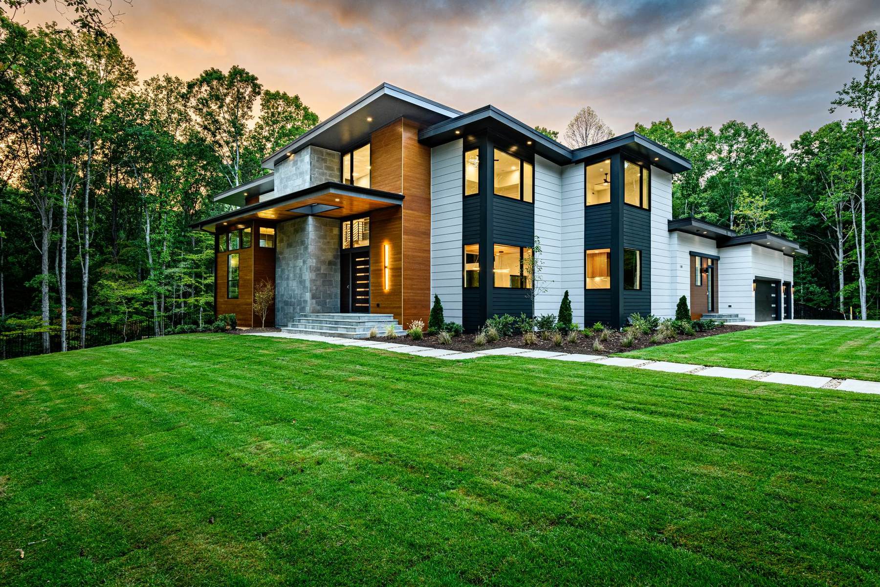 Modern custom estate at twilight by Shail Construction in Raleigh NC