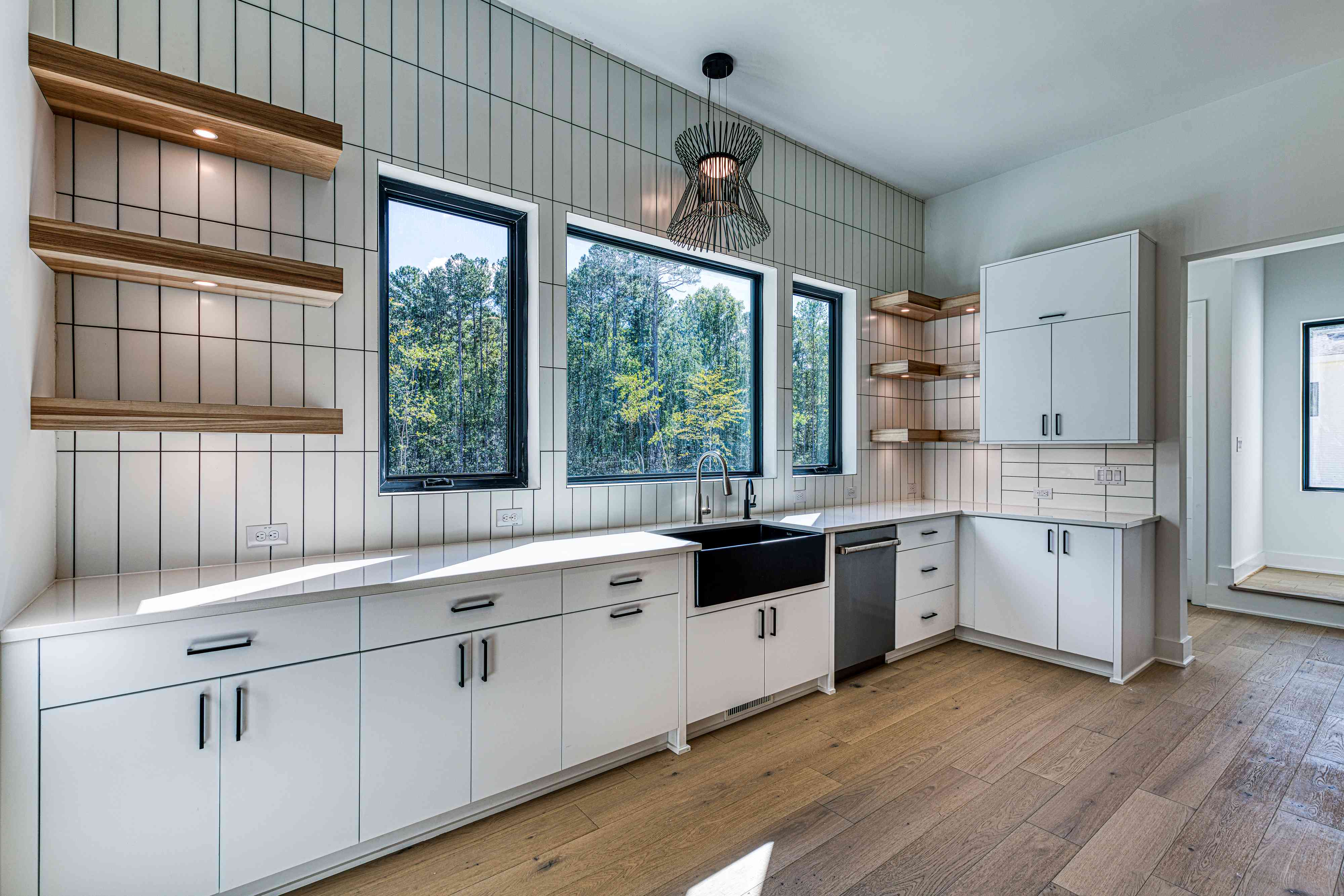 Inset cabinetry kitchen with brass hardware by Shail Construction in Raleigh NC