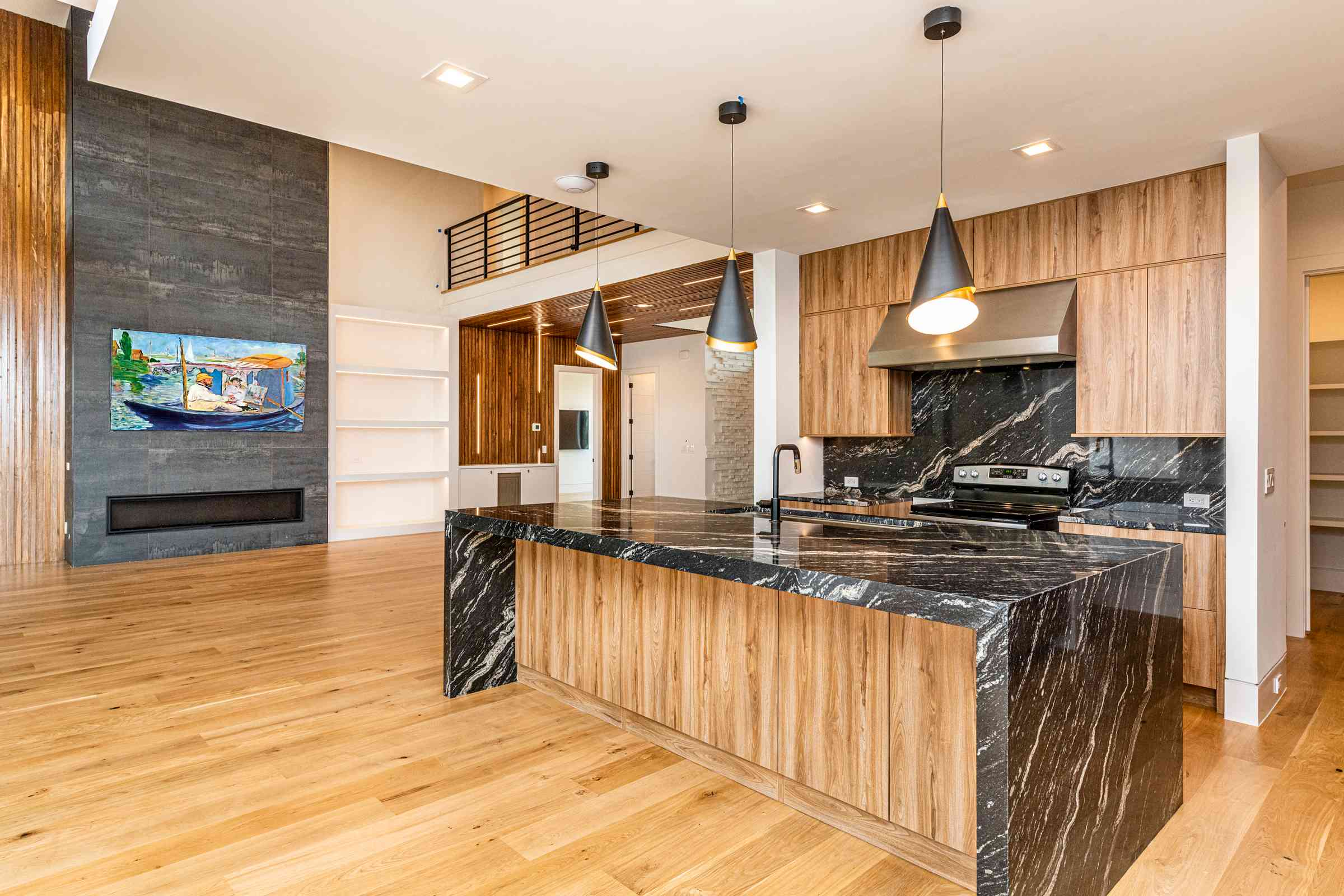 Bright transitional kitchen with island seating by Shail Construction in Durham NC