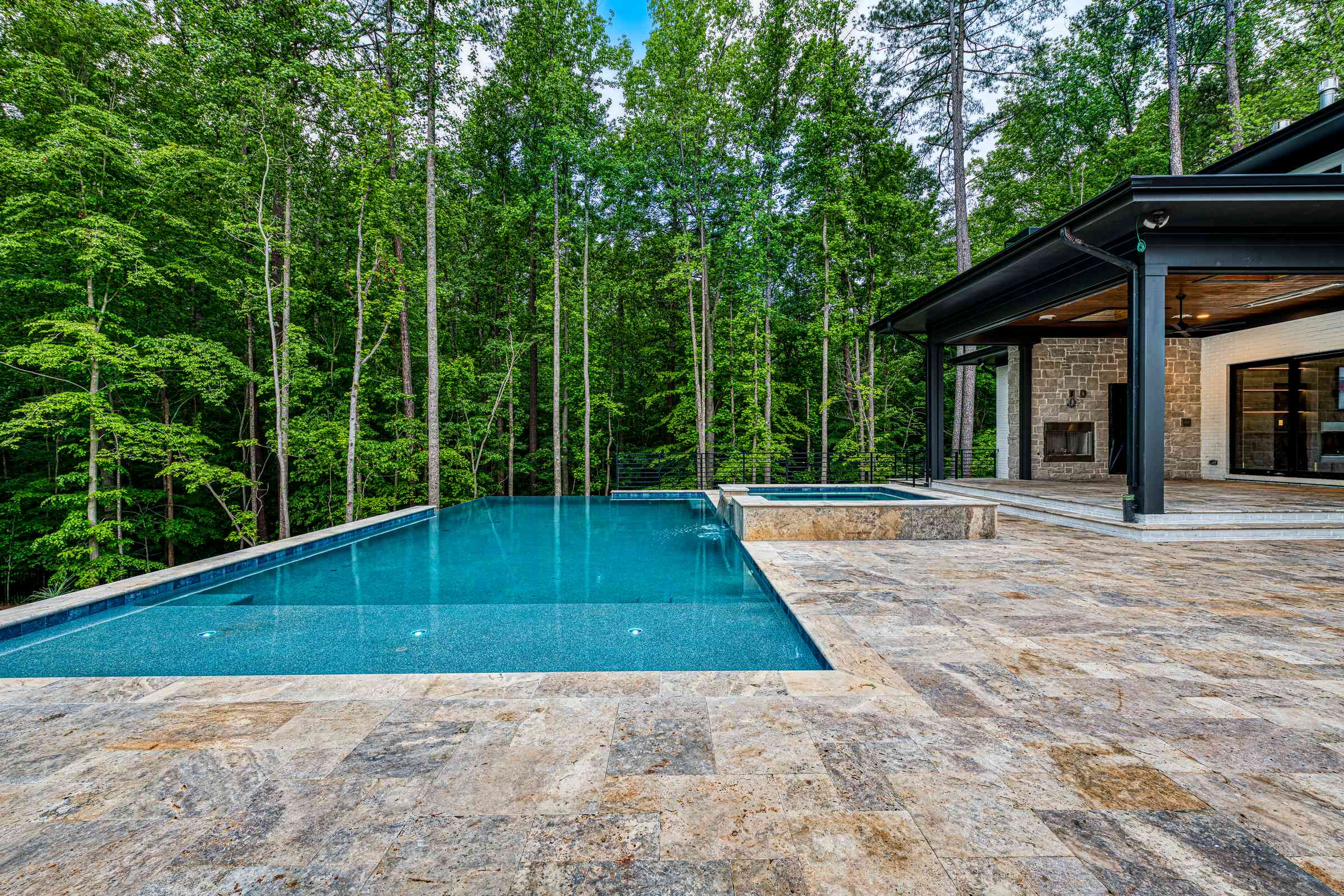 Resort-grade pool and outdoor living area by Shail Construction in Raleigh NC