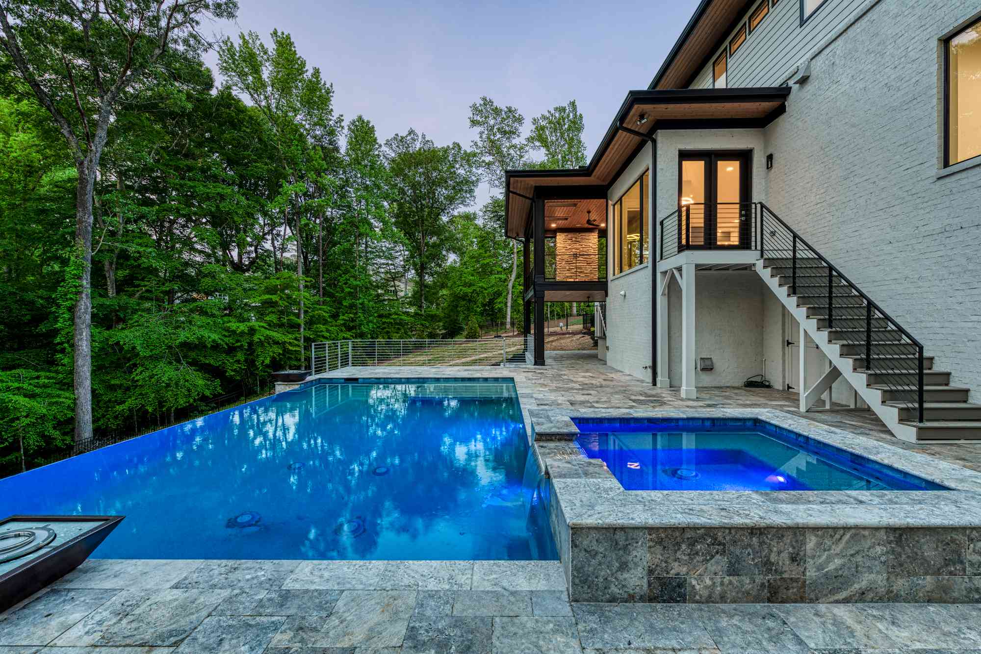 Afternoon pool with pavilion seating by Shail Construction in Chapel Hill NC