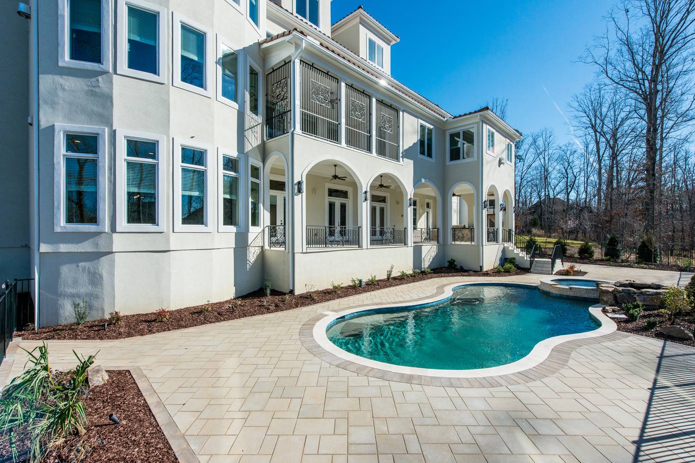 Lot 16 Regency Outdoor · Backyards photograph by Shail Construction in Raleigh NC