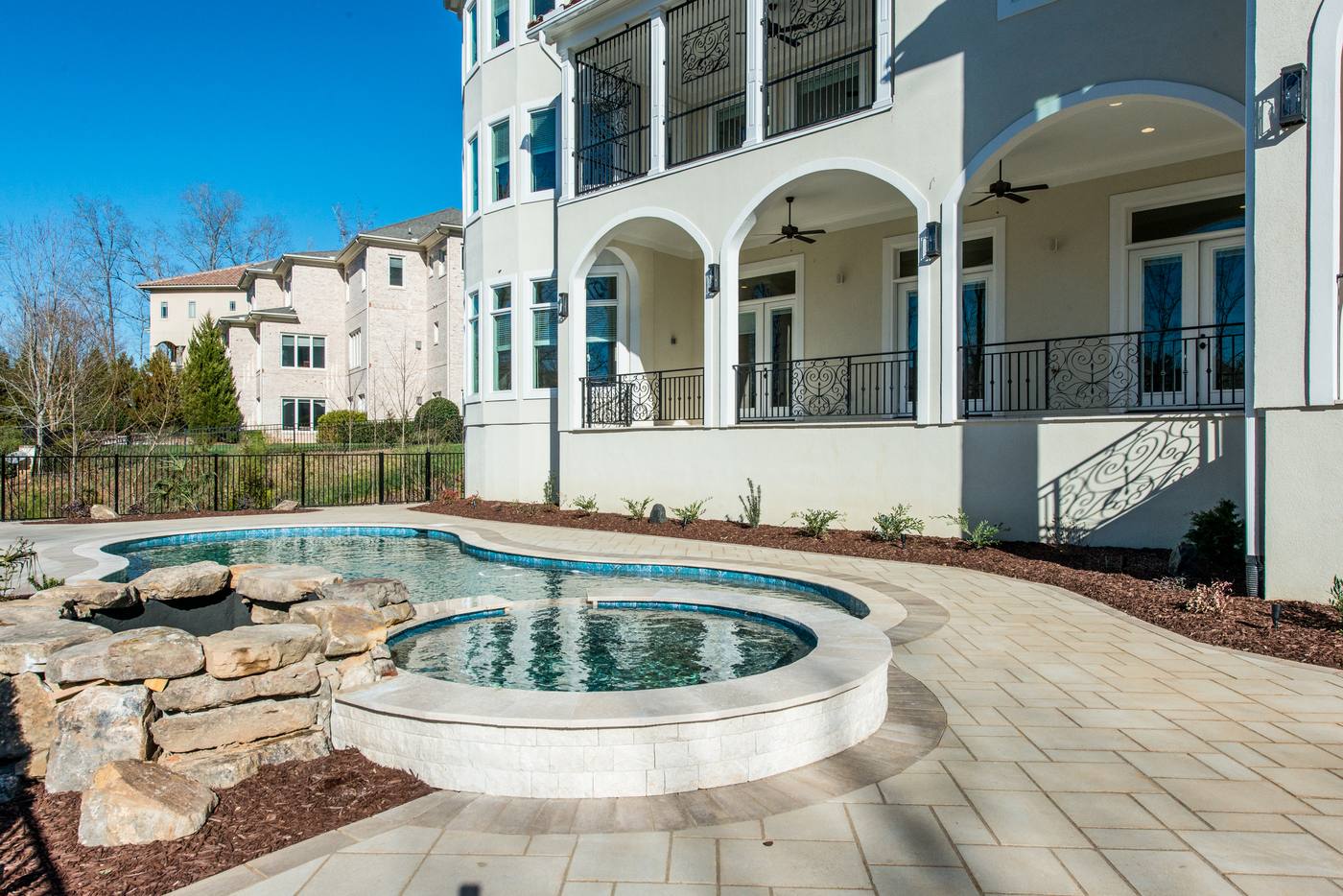 Lot 16 Regency Outdoor · Backyards photograph by Shail Construction in Raleigh NC