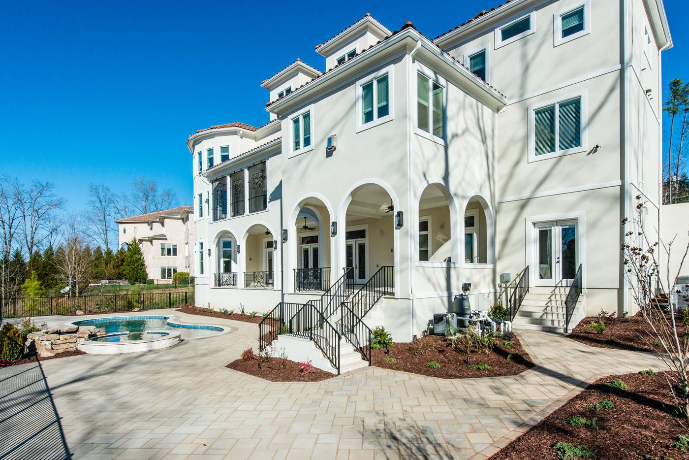 Lot 16 Regency Outdoor · Backyards photograph by Shail Construction in Raleigh NC