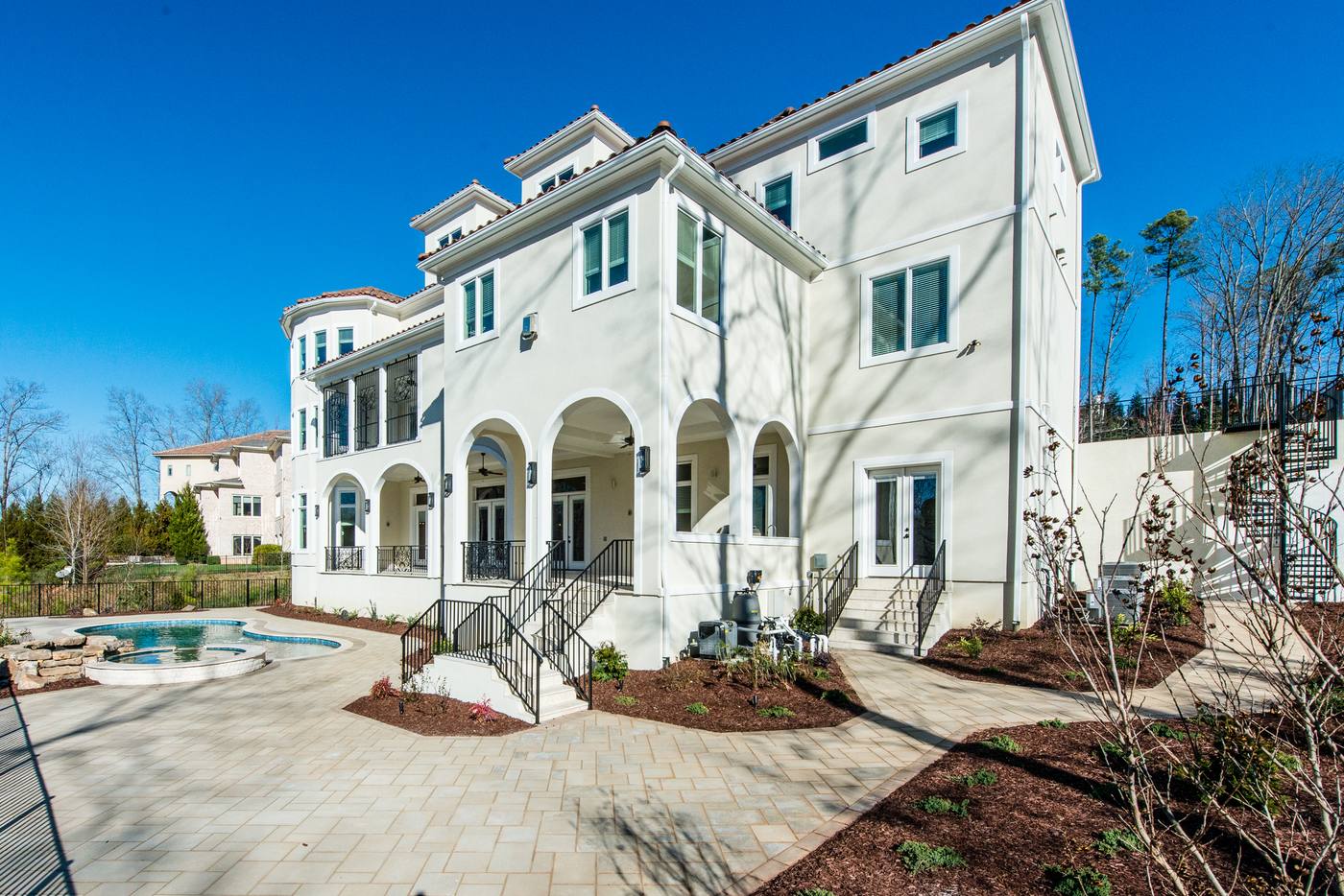 Lot 16 Regency Outdoor · Backyards photograph by Shail Construction in Raleigh NC