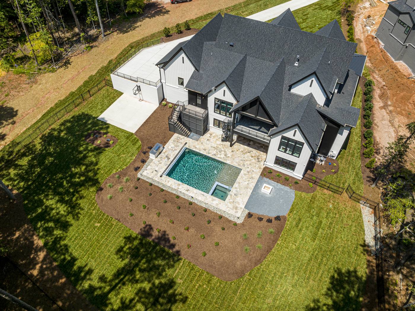 Lot 7 Bella Terra Outdoor · Backyards photograph by Shail Construction in Raleigh NC