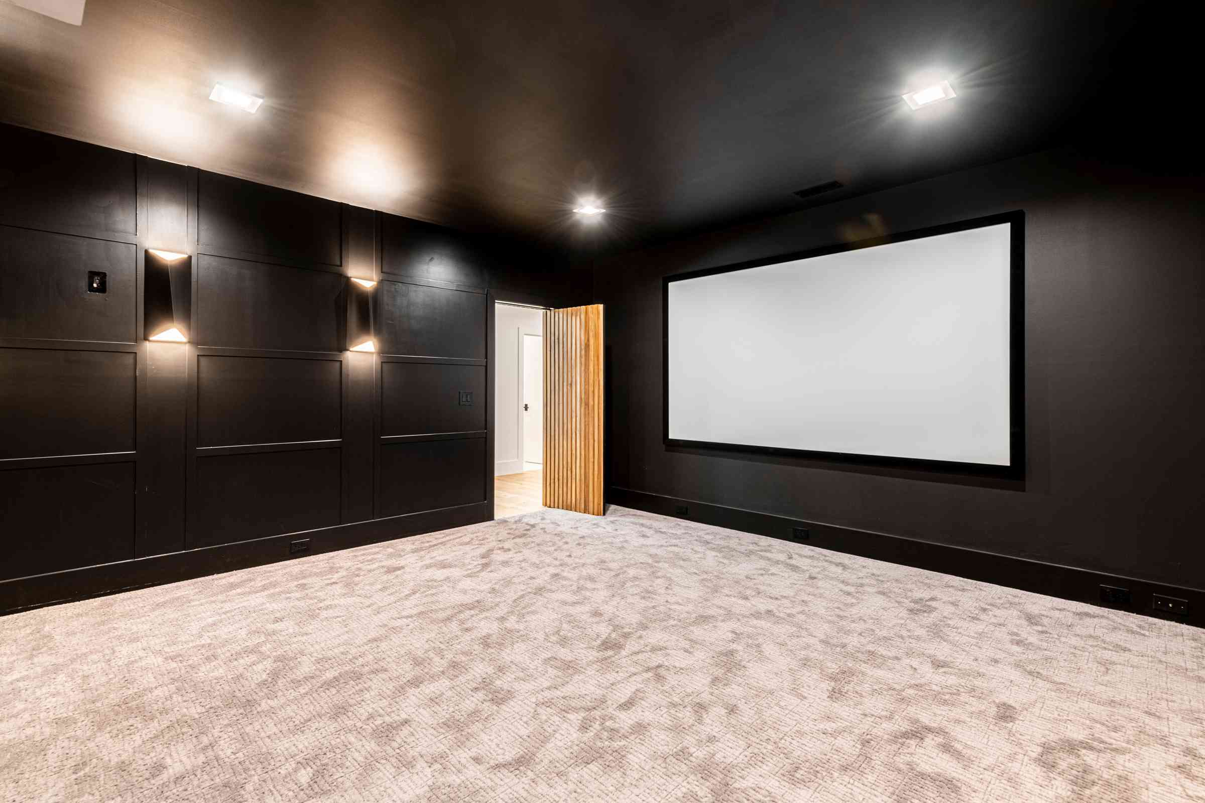Home theater with acoustic wall panels by Shail Construction in Raleigh NC